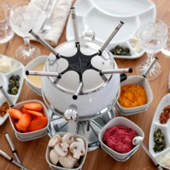 Fondueset, Edelstahl Fondueset 1 x Fonduetopf, 1 x Spritzschutz, 1 x Rechaud mit Drehkarusell, 1 x Brenner, 6 x Fonduegabeln, 6 x Fonduelöffel, 6 x Schälchen, 6 x Fondueteller