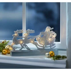 LED-Glitterdeko „Schlittenfahrt“
